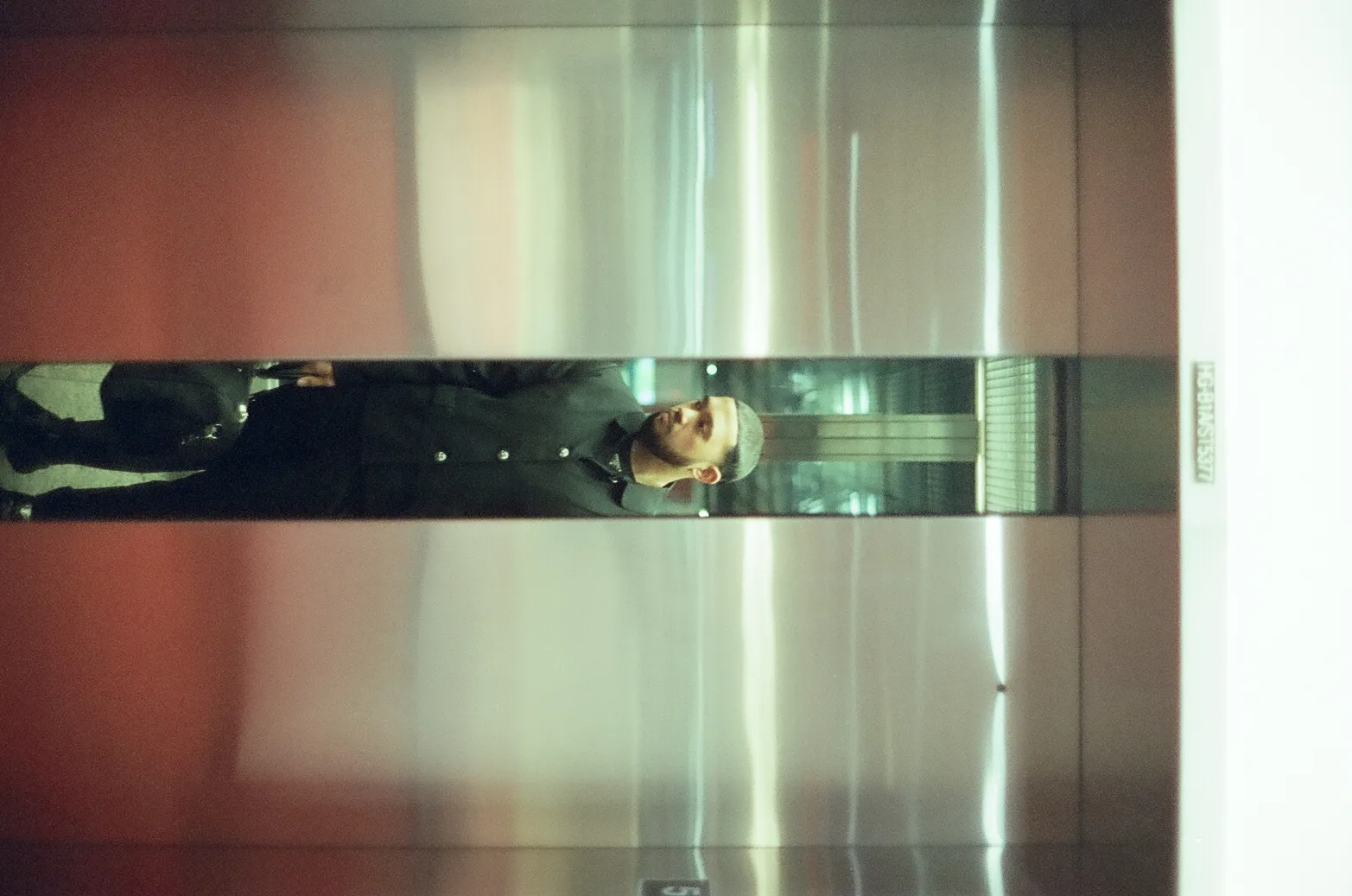 Film photograph from DMV, titled "justin3".