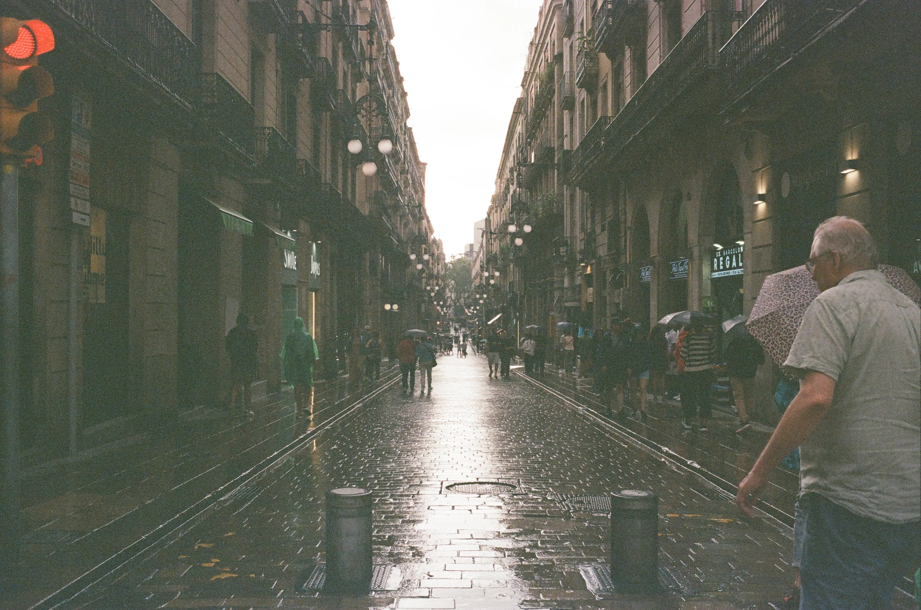 Film photograph from Spain, titled "raining barca".