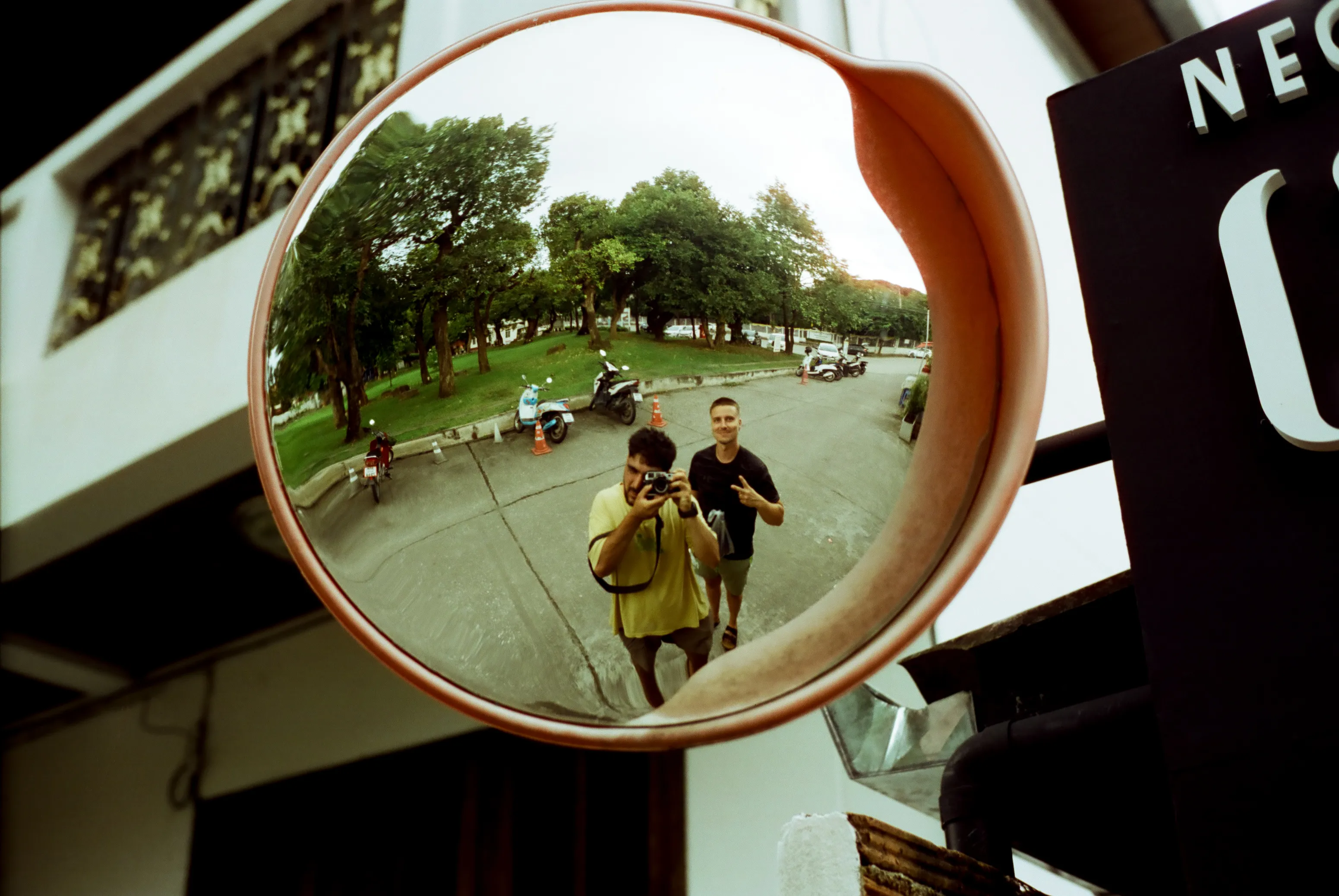 Film photograph from Thailand, titled "mirror shot cyberpunk100d".