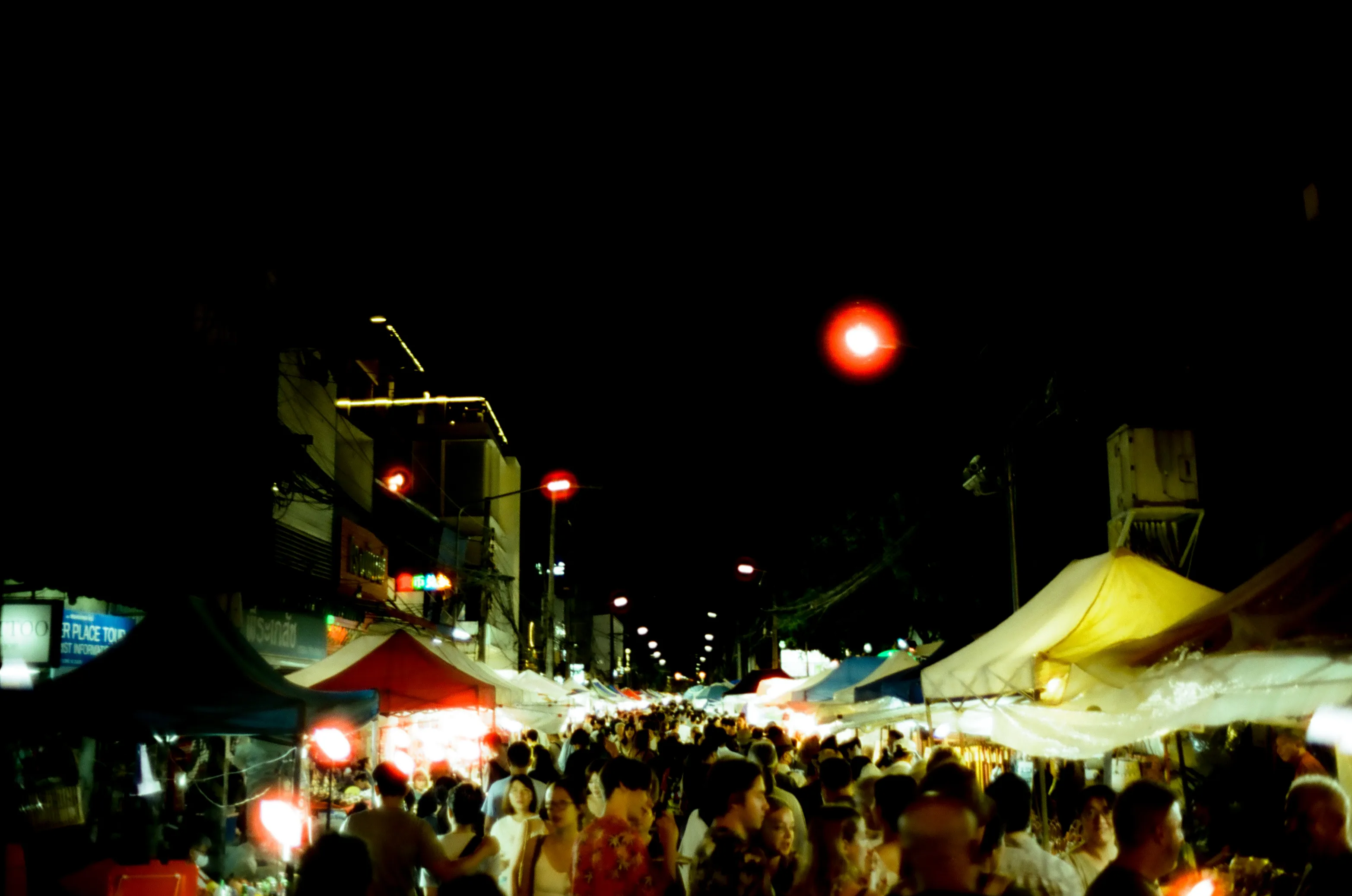 Film photograph from Thailand, titled "night market cyberpunk100d".