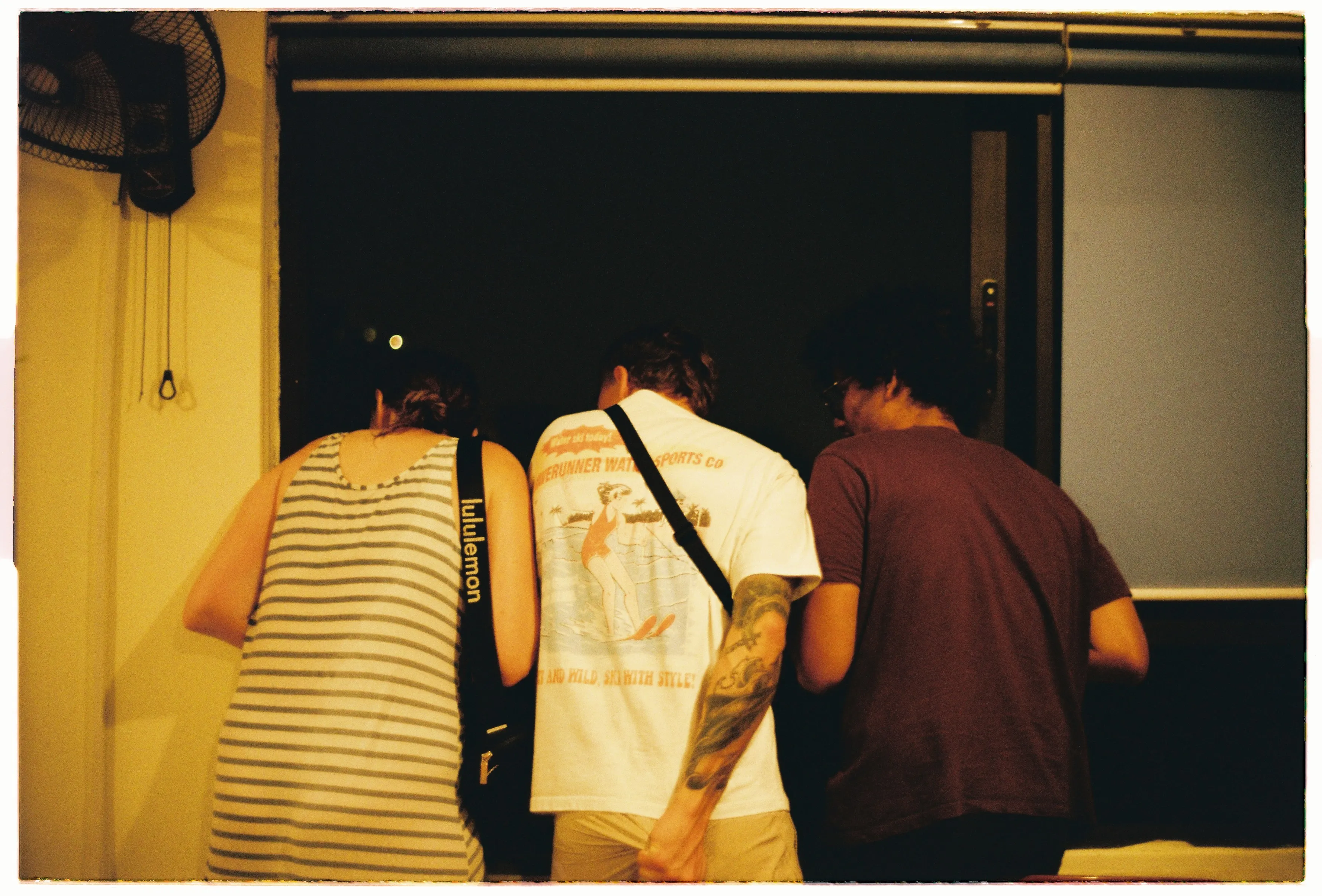 Film photograph from Vietnam, titled "ass scratch".