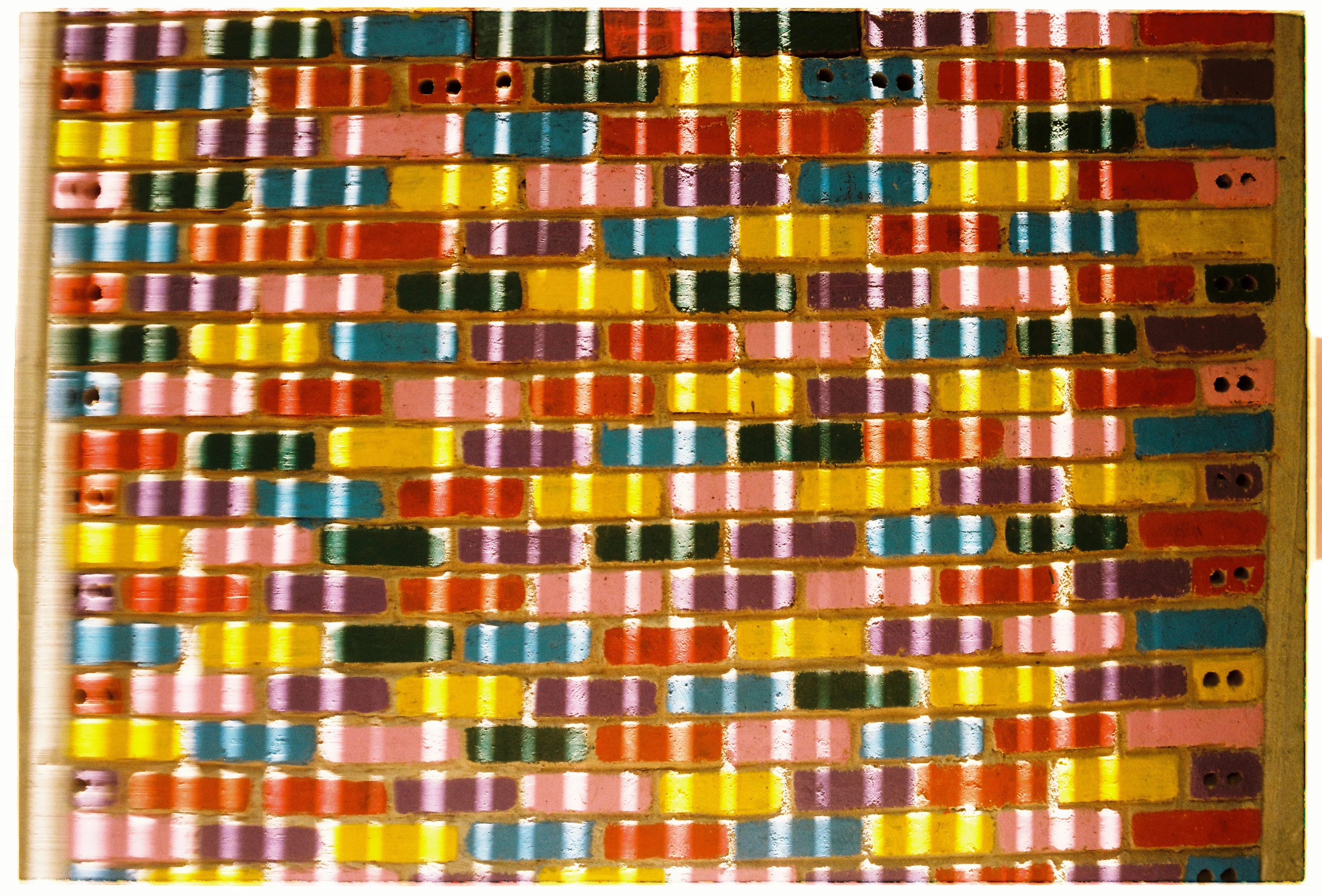 Film photograph from Vietnam, titled "brick wall".