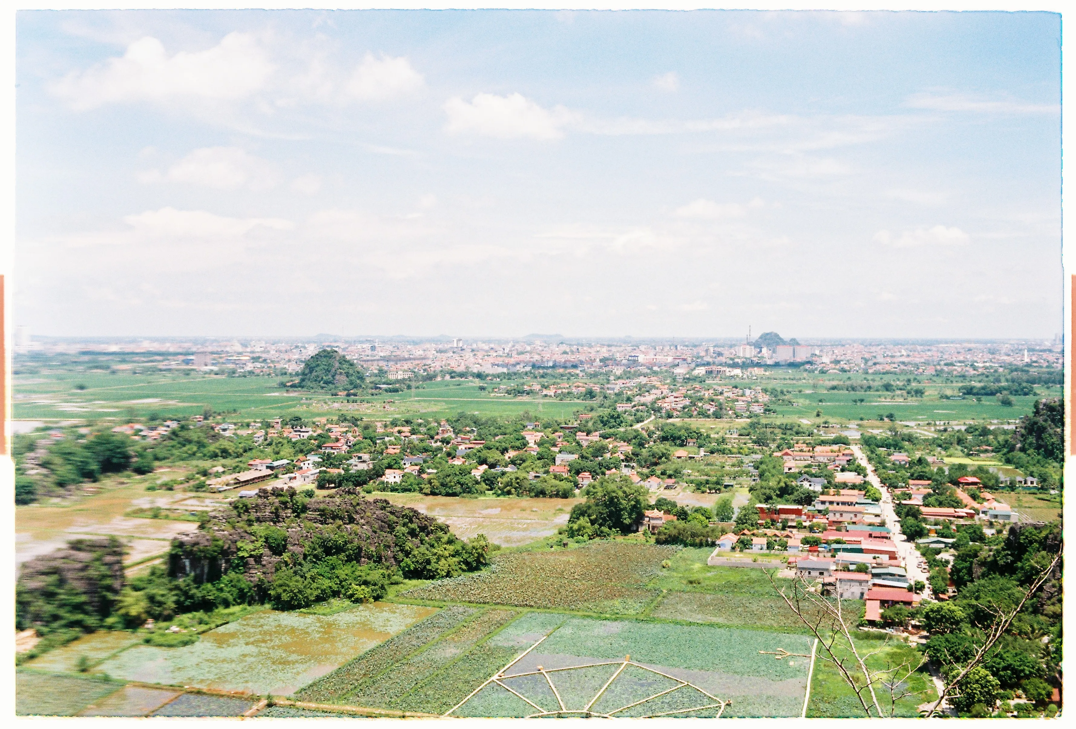 Film photograph from Vietnam, titled "city overview".