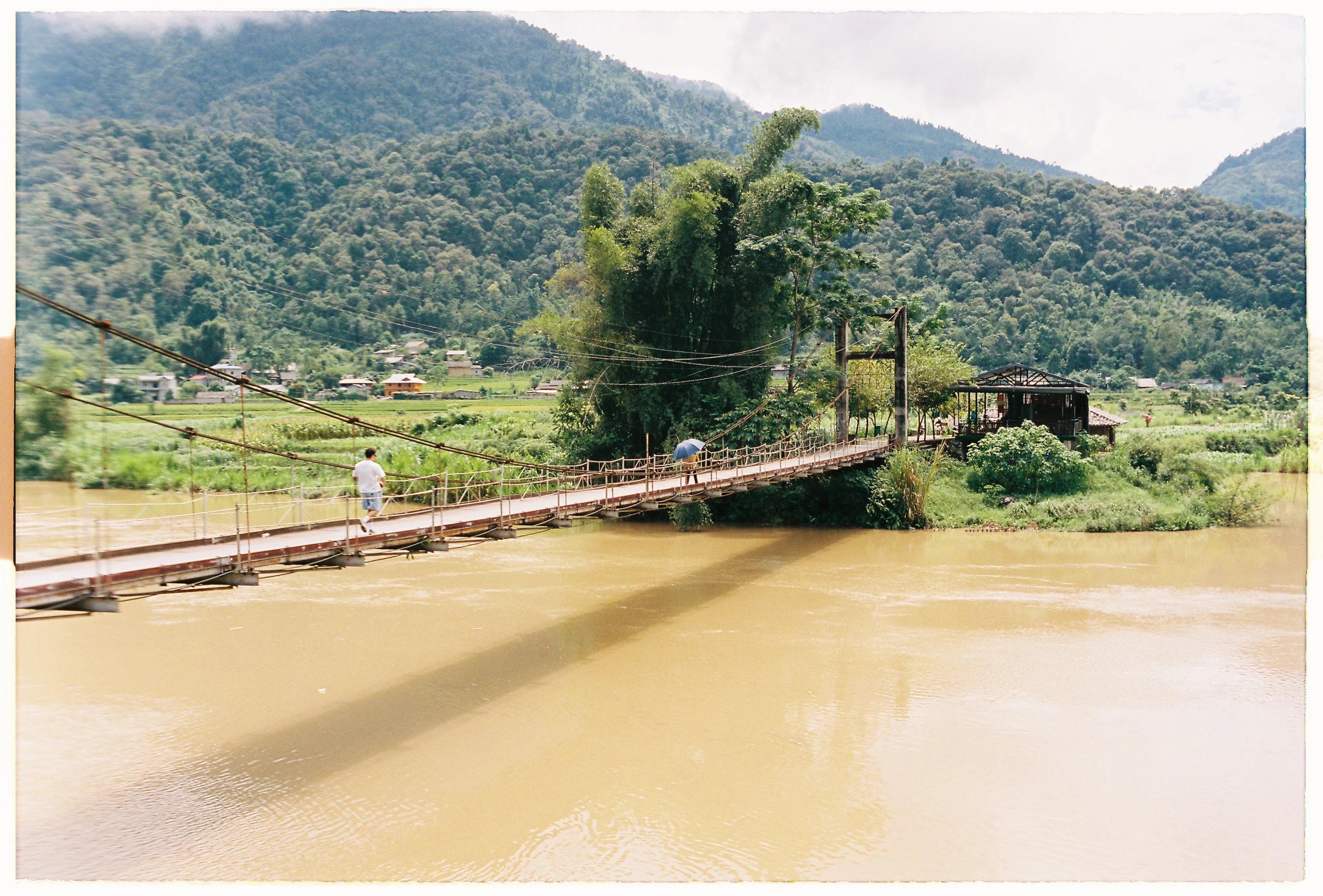 Film photograph from Vietnam, titled "ha giang bridge".